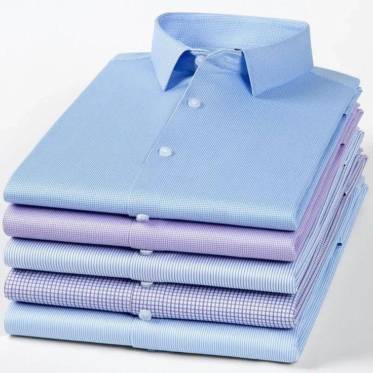 May đồng phục công sở TPHCM: bộ sơ mi - chân váy - vest cho doanh nghiệp 9 chồng áo sơ mi công sở xanh tím kẻ caro gấp gọn — bảng màu đồng phục văn phòng